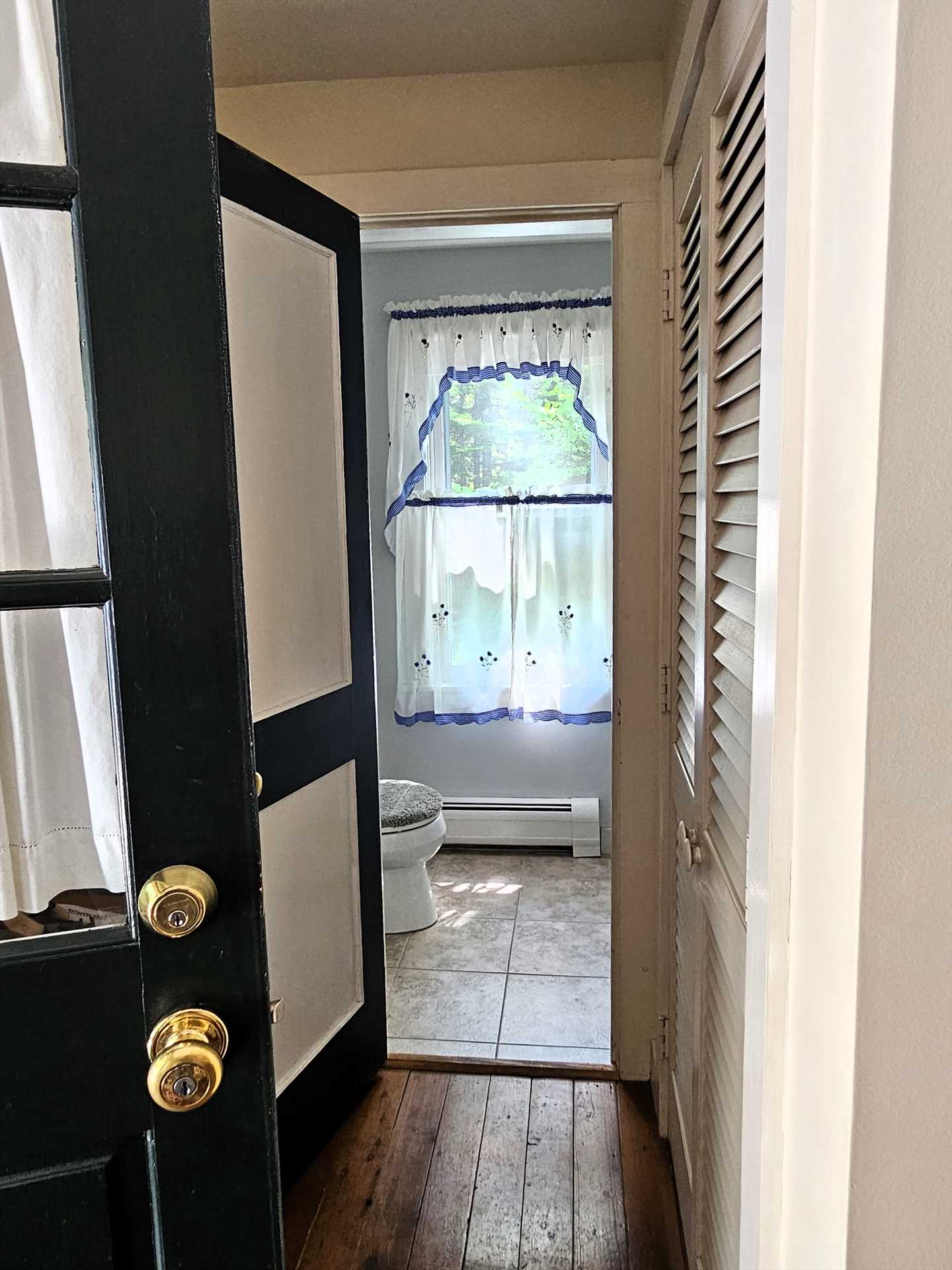 Powder room off front entry
