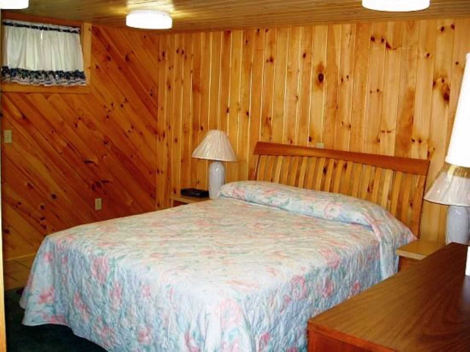 Lower level bedroom with queen bed and private bath