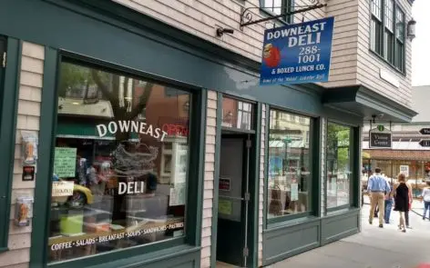 A store front with several different types of food.